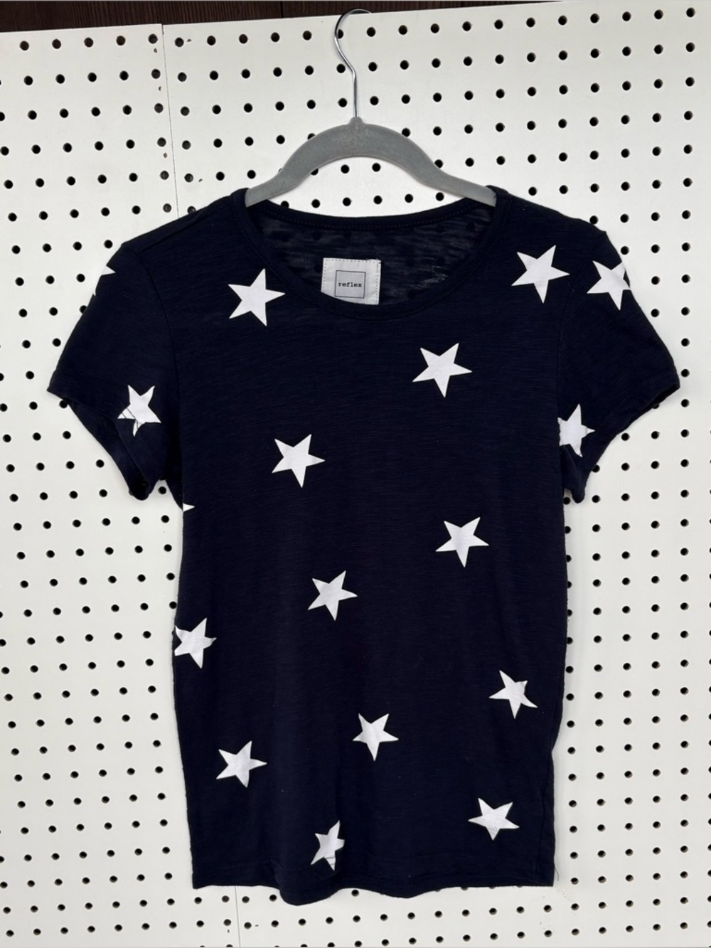 Reflex Woman’s Dark Blue Shirt with  White Stars Size Small